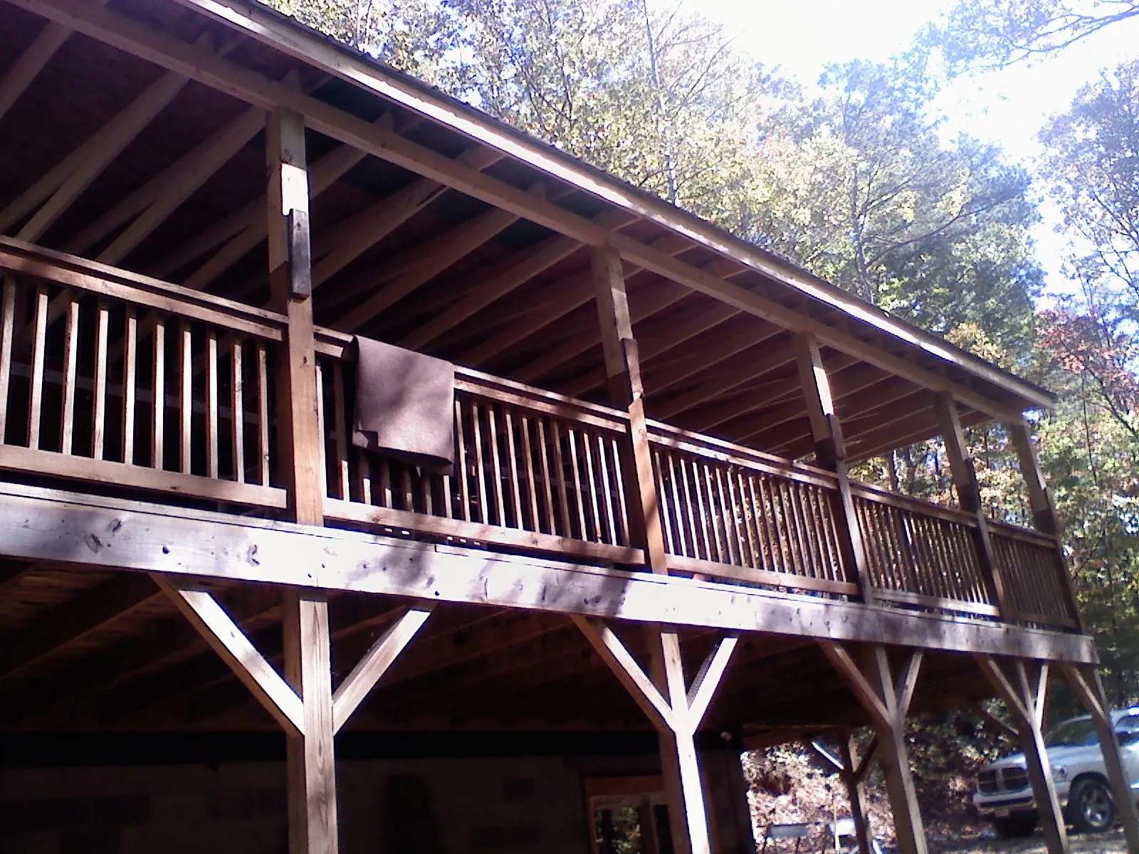 Timber framing under a new elevated porch and deck — Roof Leak Repair in Bellmore by Roofing Brothers